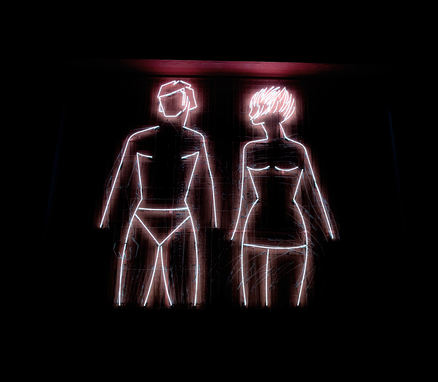 Słynny neon - przedstawiający rozbierajacą i ubierajacą sią parę. Powr&oacute;cil na Dom Handlowy Central na jego 50. rocznicę. Ł&oacute;dź, październik 2022 r.