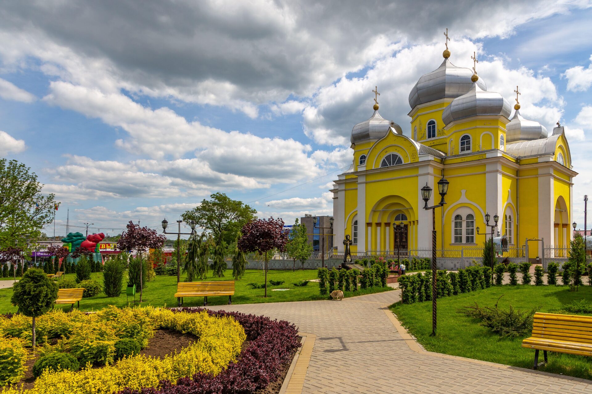 Comrat, Gagauzia, Republic of Moldova - 02 May 2016: Bell Tower of Comrat Cathedral. The Autonomous Region of Gagauzia. A beautiful yellow church in c Radomskie arcydzieło w gagauskim Komracie